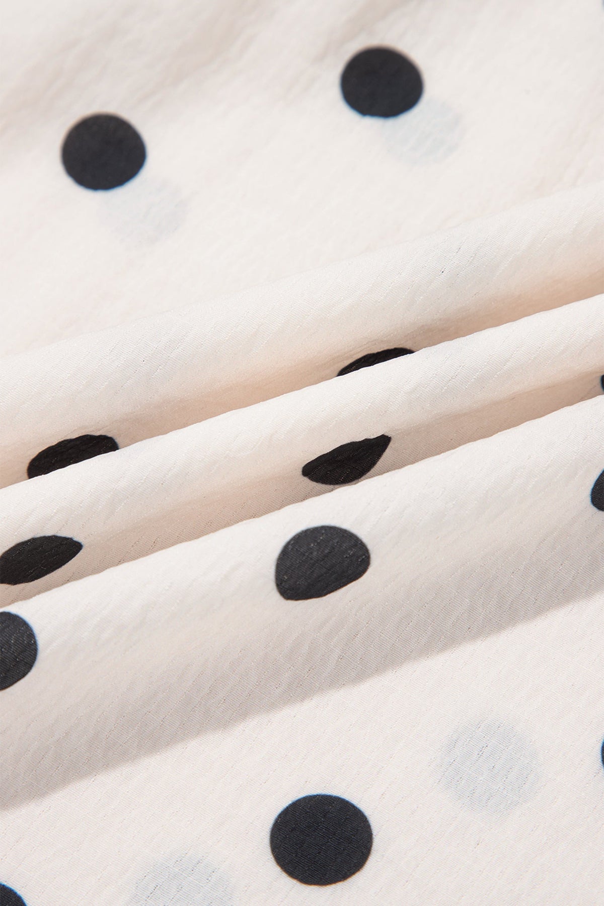 The Millie Polka Dot Ruffle Side Slit Maxi Skirt