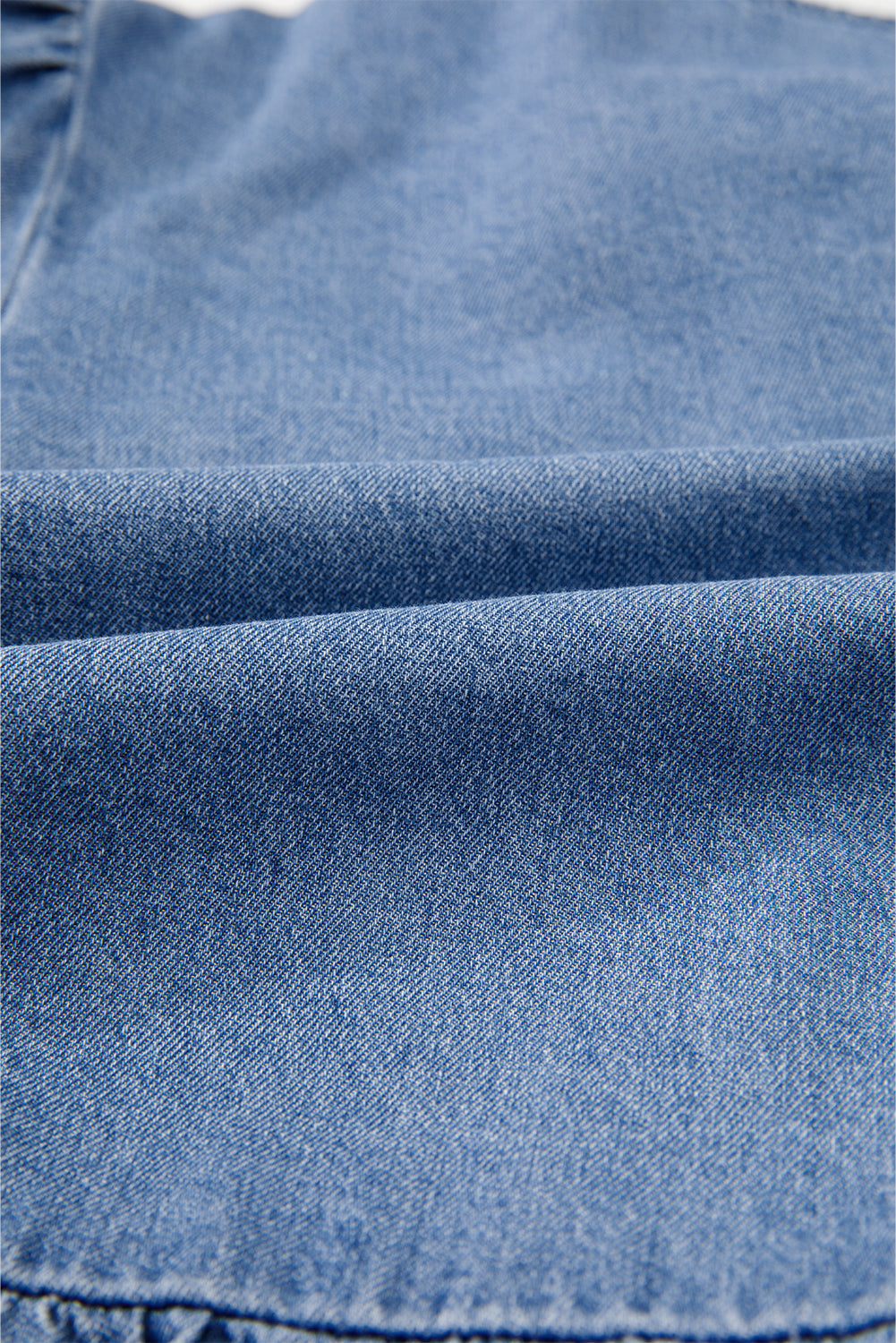 The Piper Skye Bow Peplum Denim Shirt