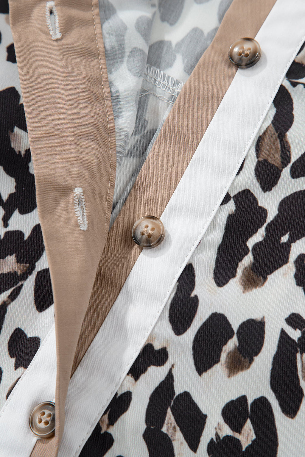 The Ava Leopard Contrast Trim Half Button Top