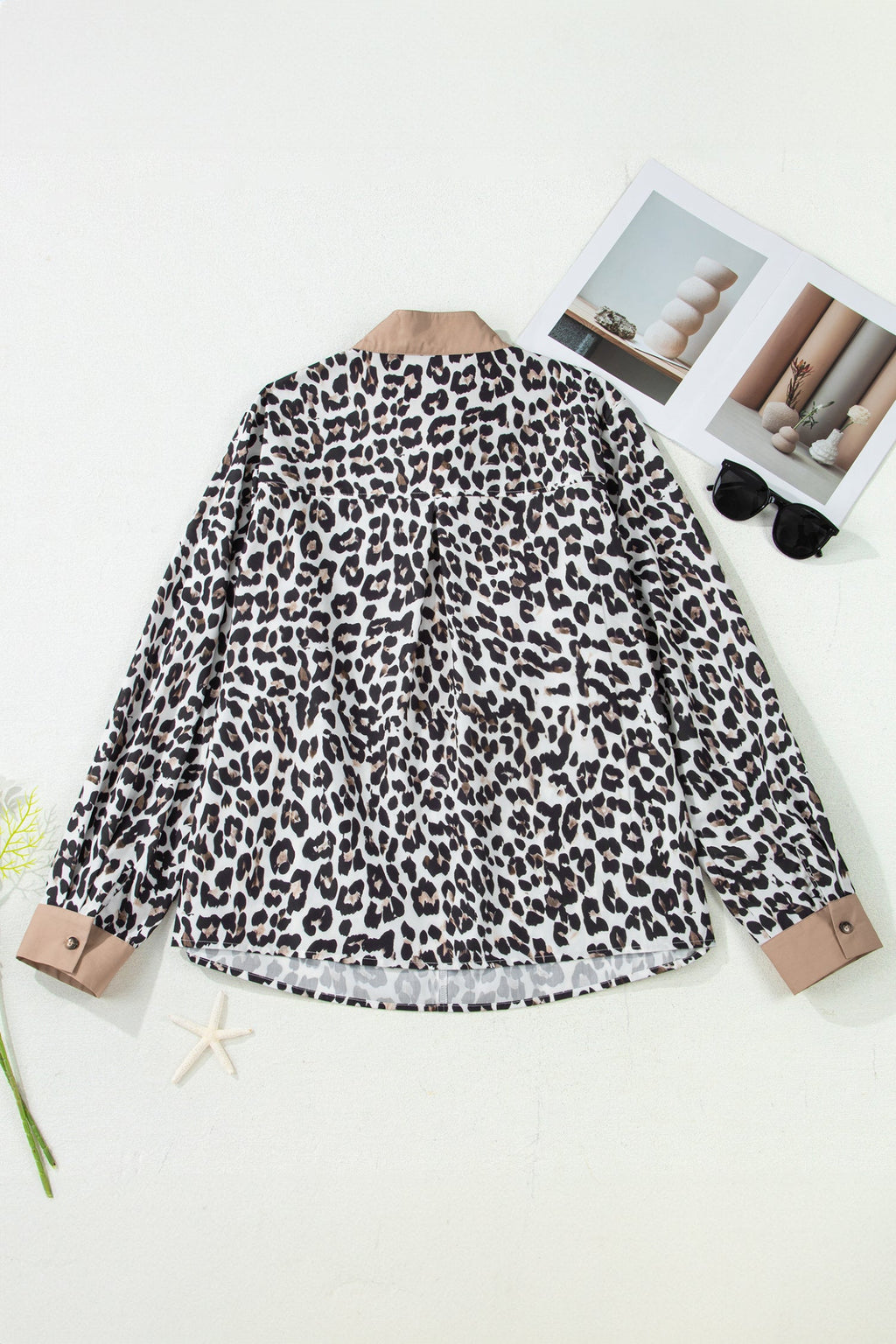 The Ava Leopard Contrast Trim Half Button Top