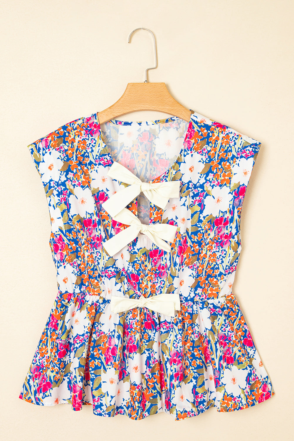 The Amelia June Floral Bow Peplum Blouse