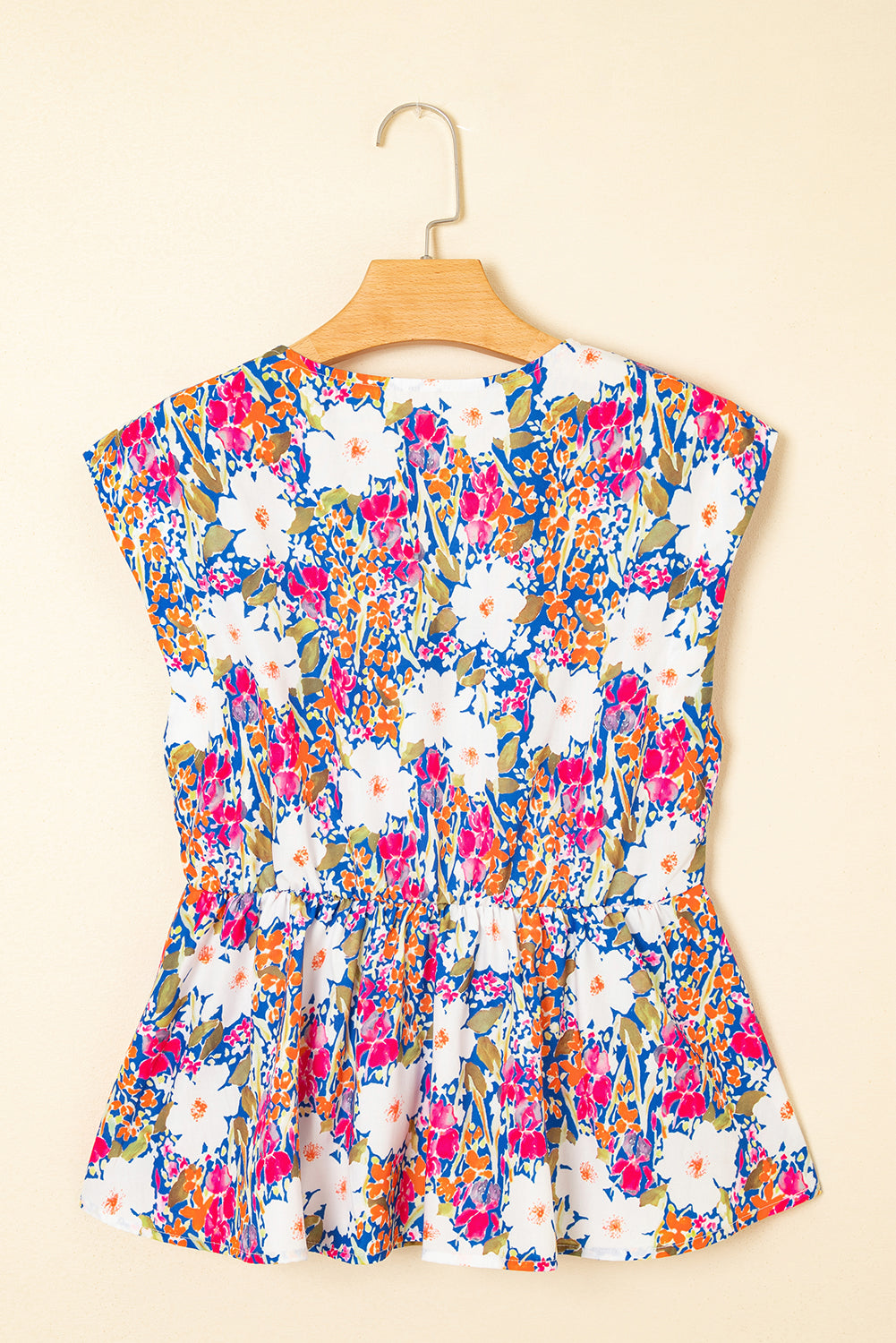 The Amelia June Floral Bow Peplum Blouse