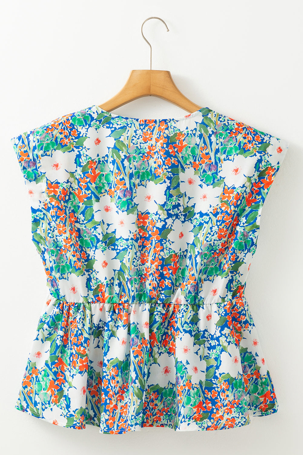 The Amelia June Floral Bow Peplum Blouse