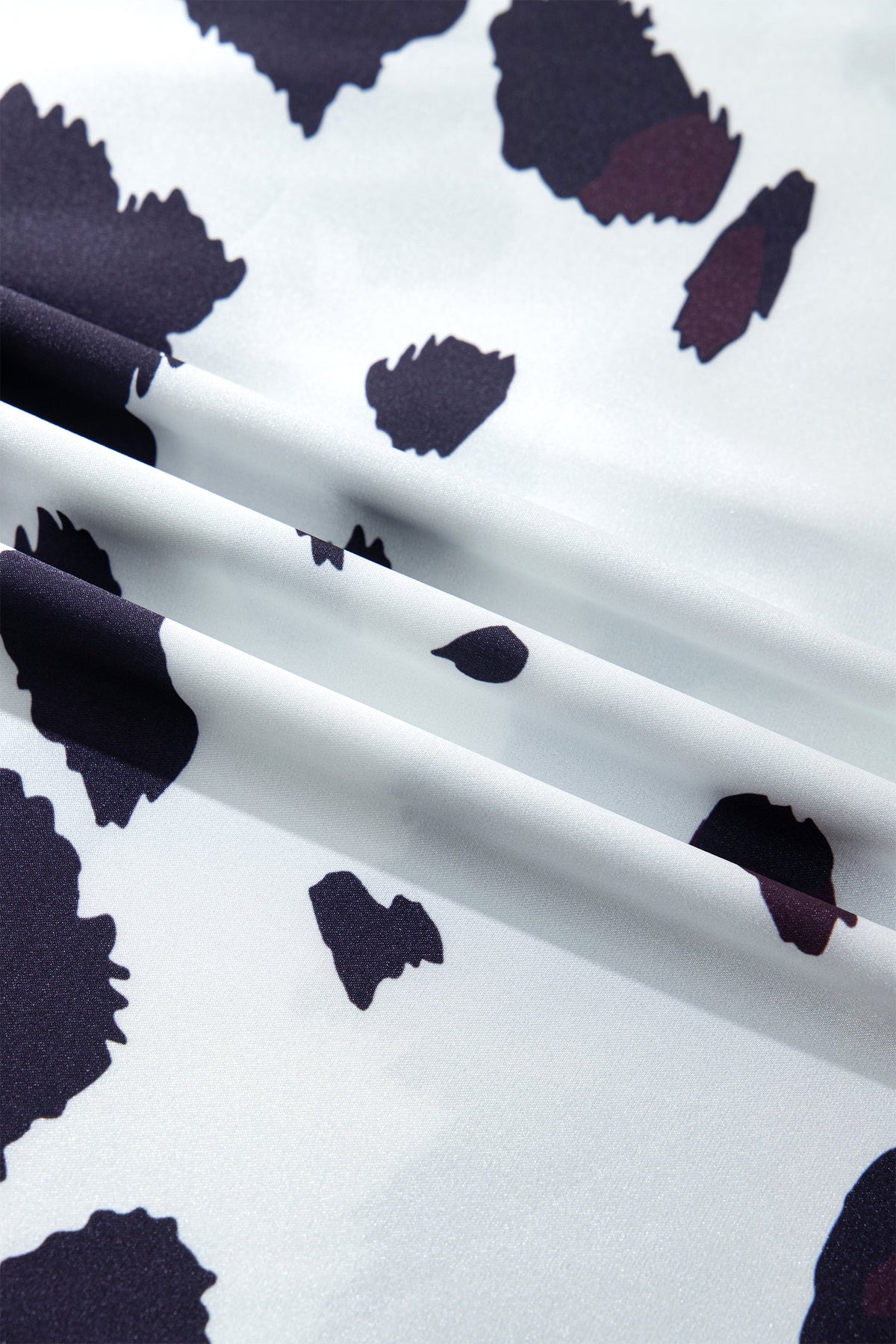 The Waverly Cow Print Midi Skirt