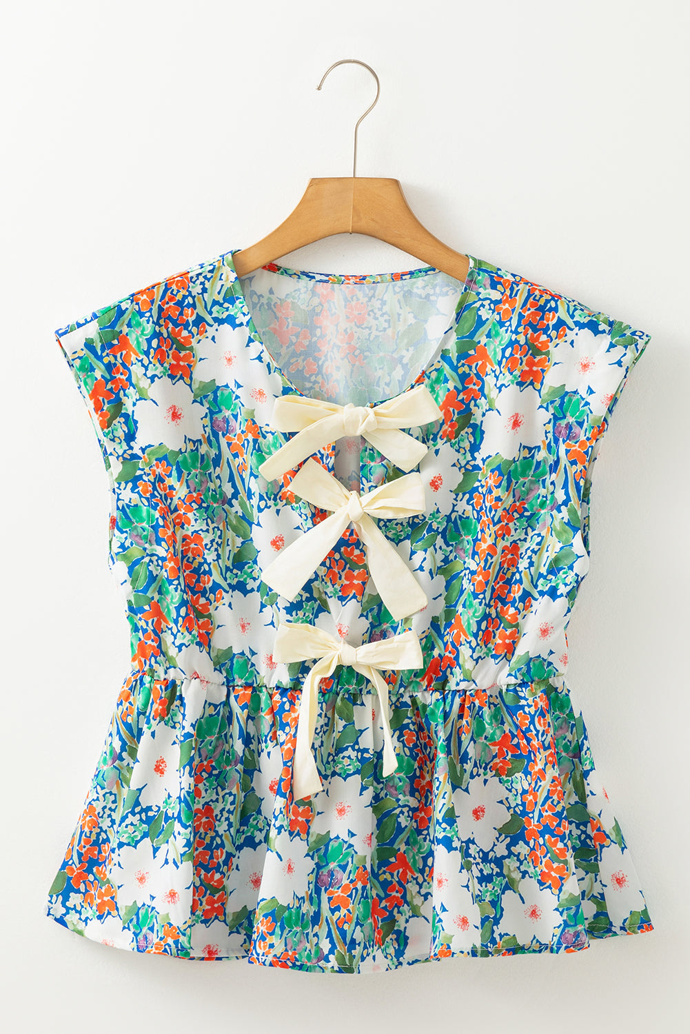 The Amelia June Floral Bow Peplum Blouse