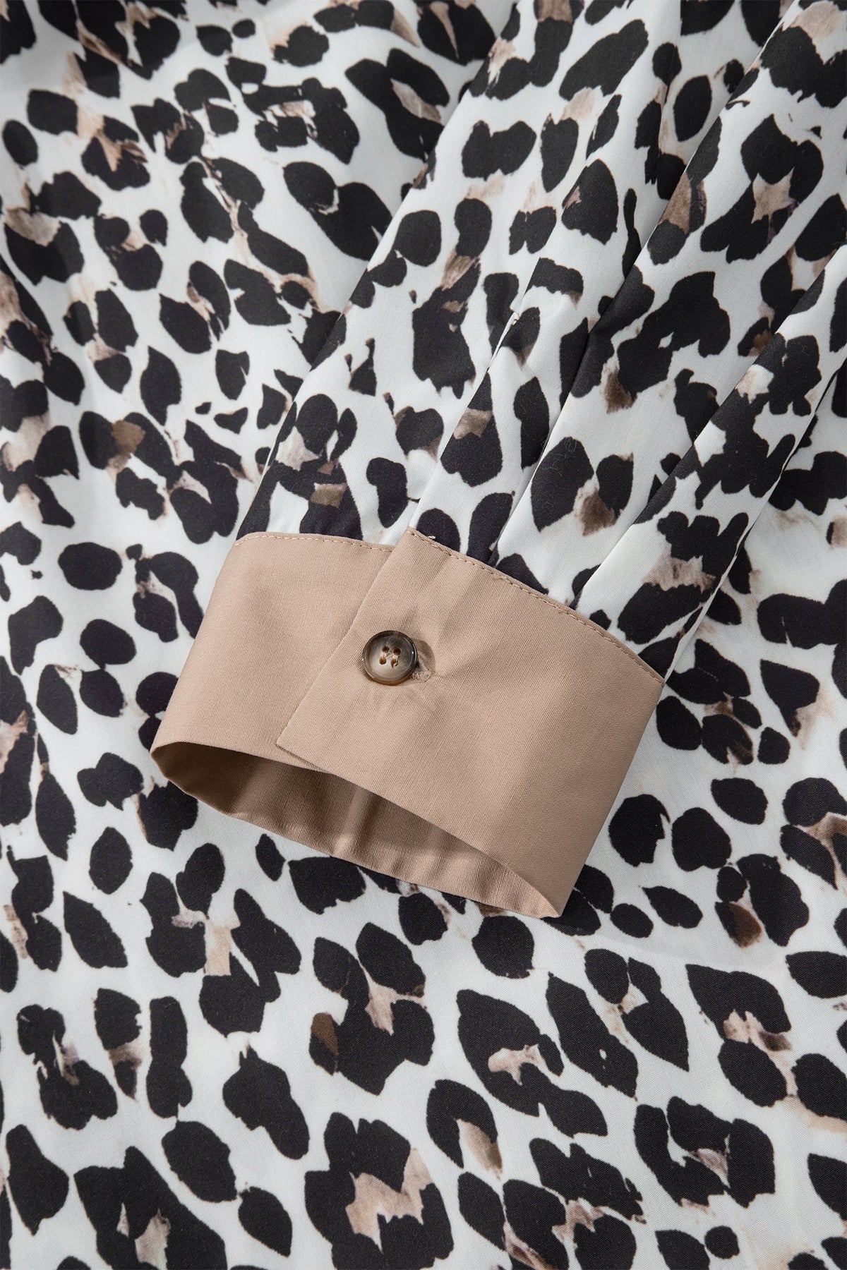 The Ava Leopard Contrast Trim Half Button Top
