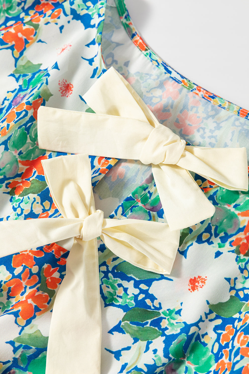 The Amelia June Floral Bow Peplum Blouse