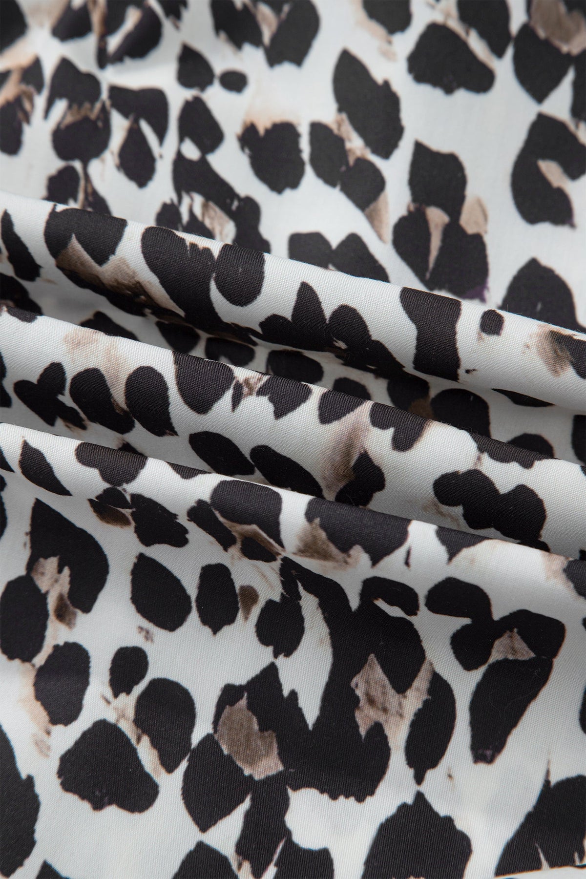 The Ava Leopard Contrast Trim Half Button Top