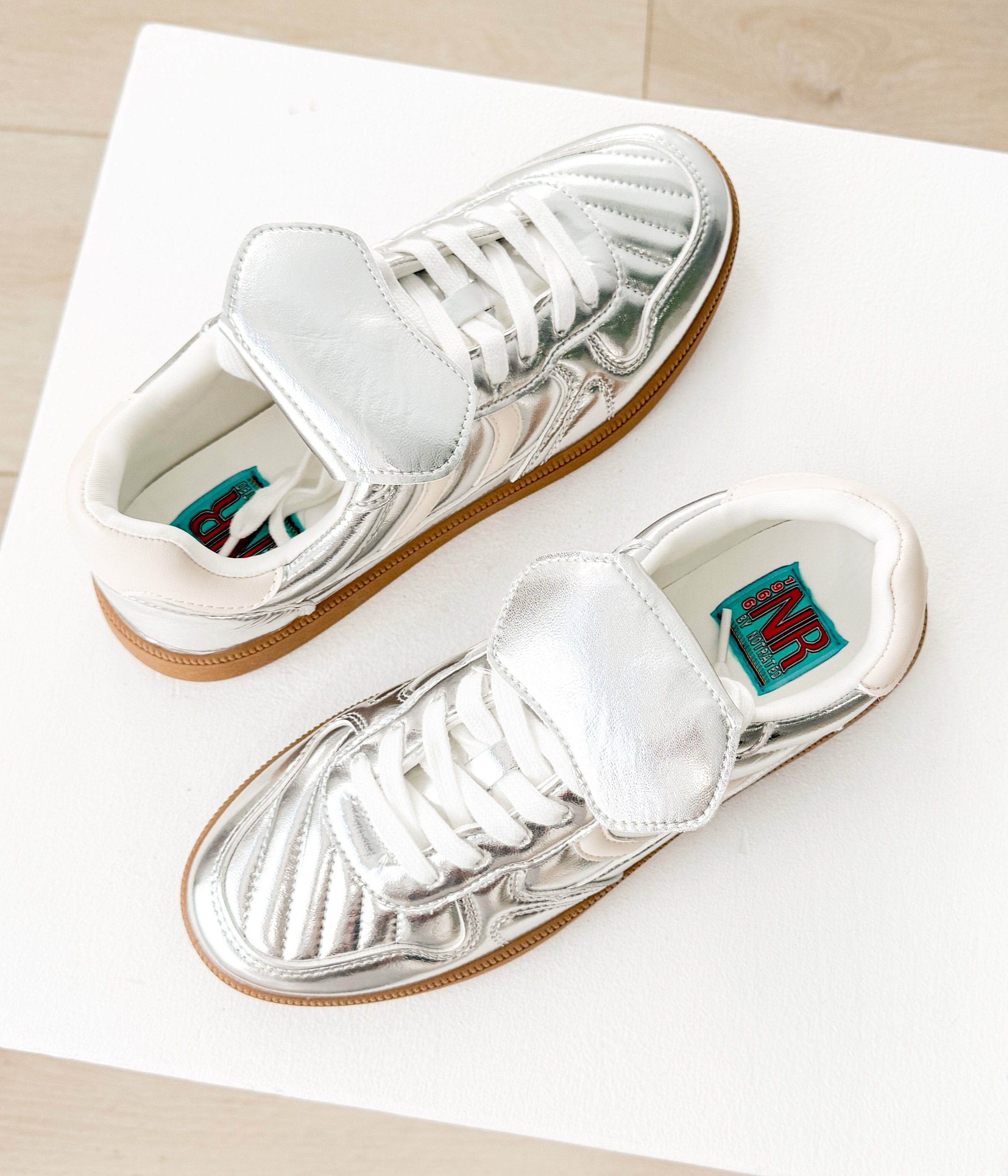 The Milan Metallic Sneaker in Silver