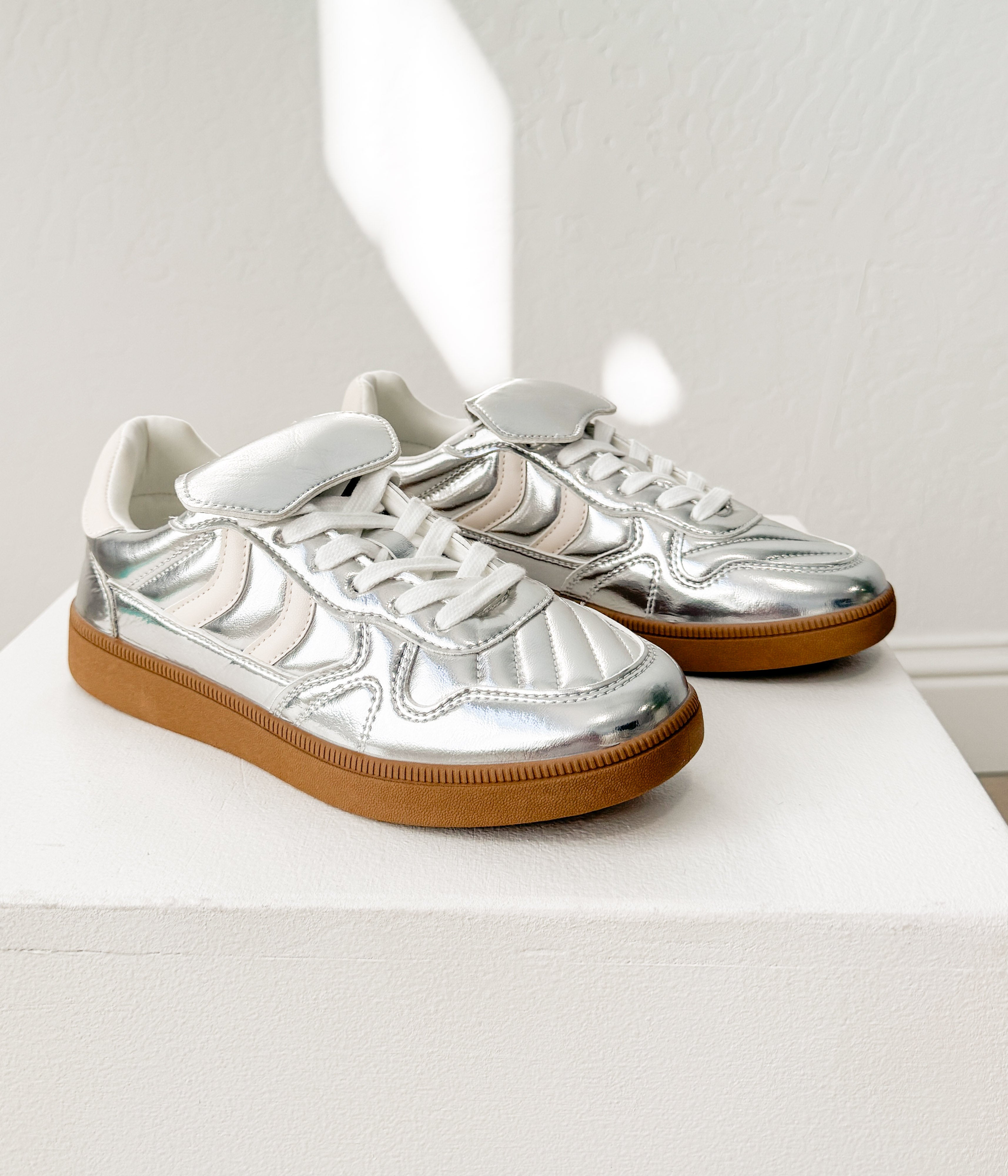 The Milan Metallic Sneaker in Silver