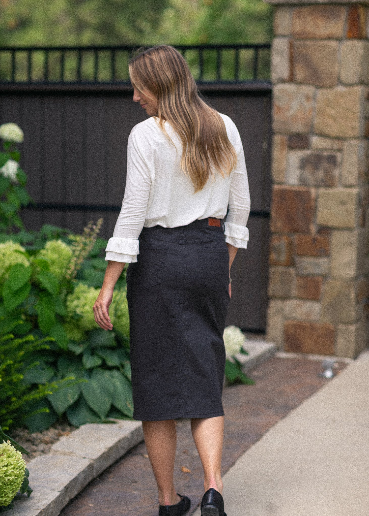 The Remi Onyx Black Denim Midi Skirt
